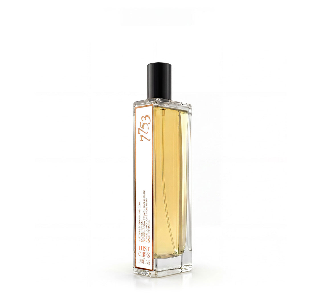 A 7753 glass perfume bottle with a black cap on a white background.