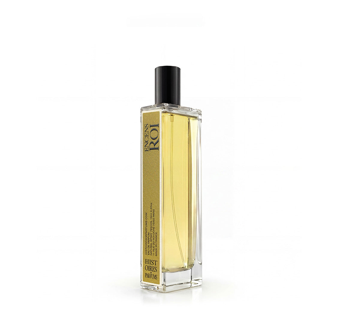 A Encens Roi glass perfume bottle with a black cap on a white background.
