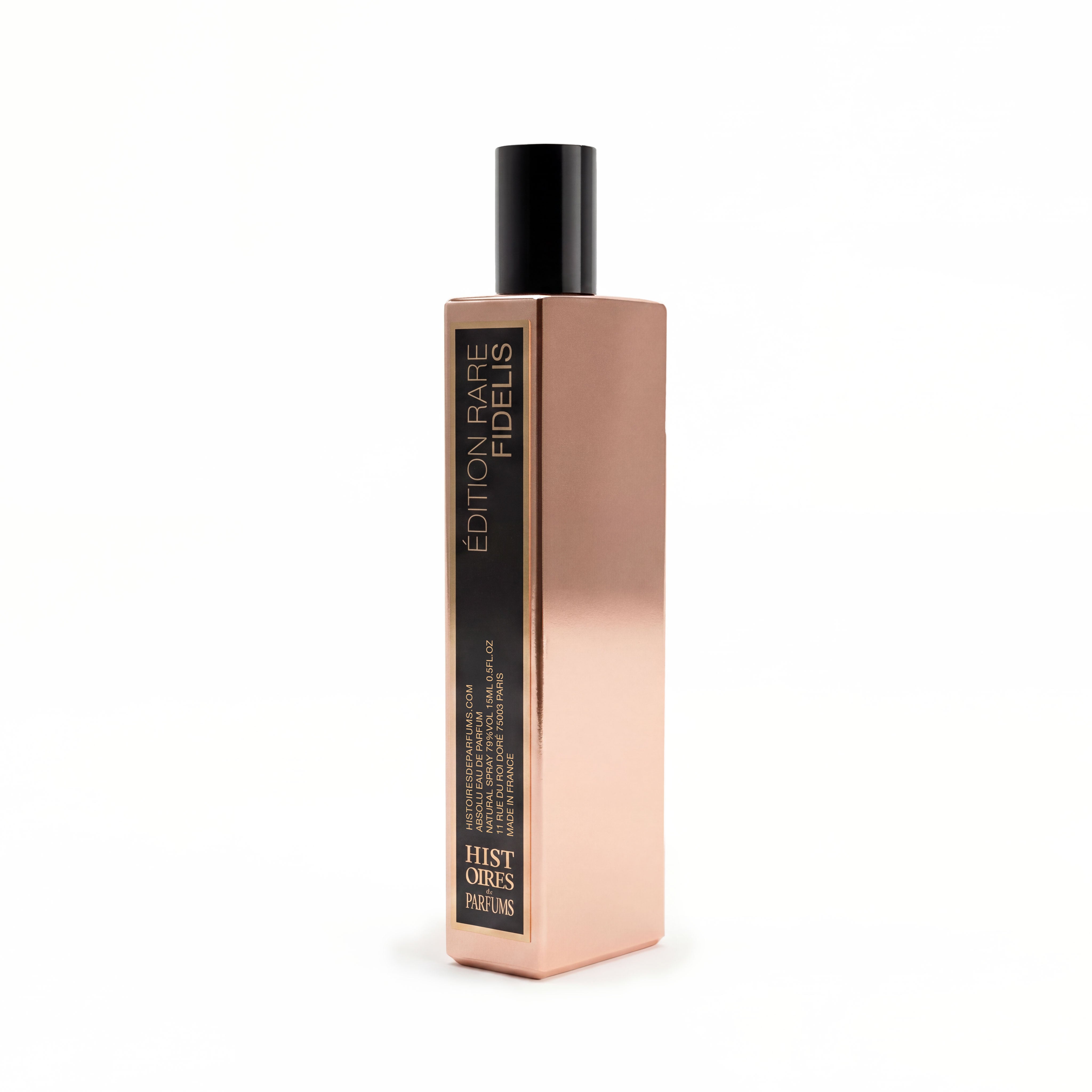A metallic rose gold bottle of Fidélis on a plain white background.