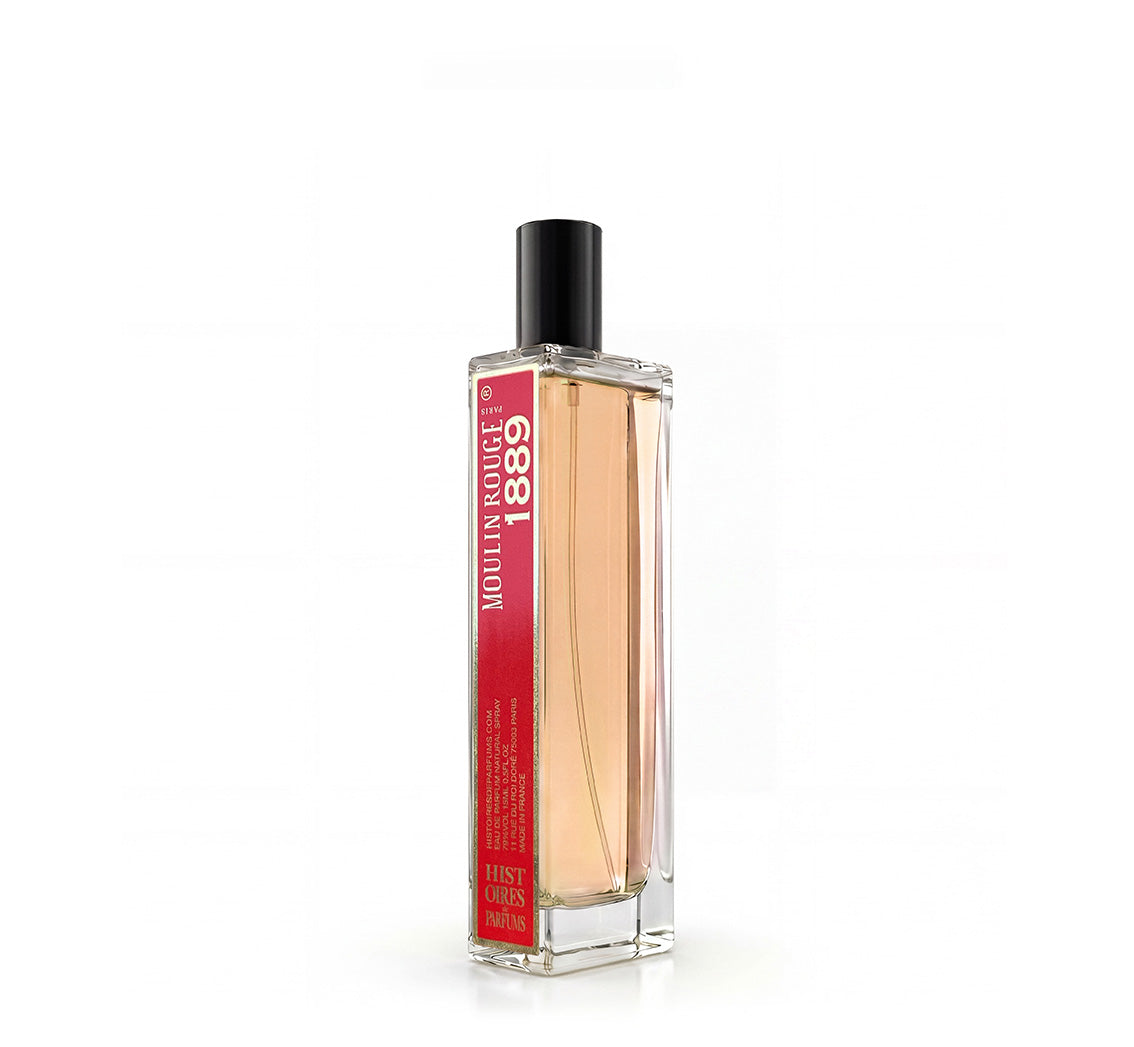 A 1889-Moulin Rouge glass perfume bottle with a black cap on a white background.