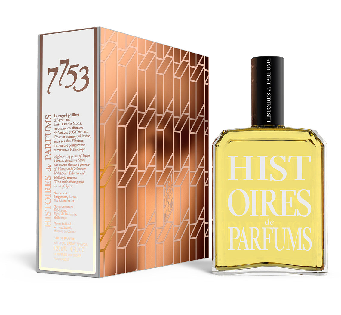 A perfume bottle of 7753 - 120ml next to its packaging box.