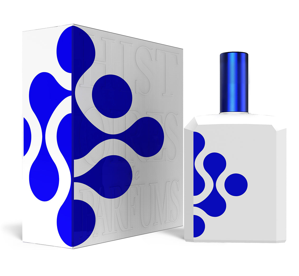 A perfume bottle of This is not a blue bottle 1/.5 - 115ml next to its packaging box.