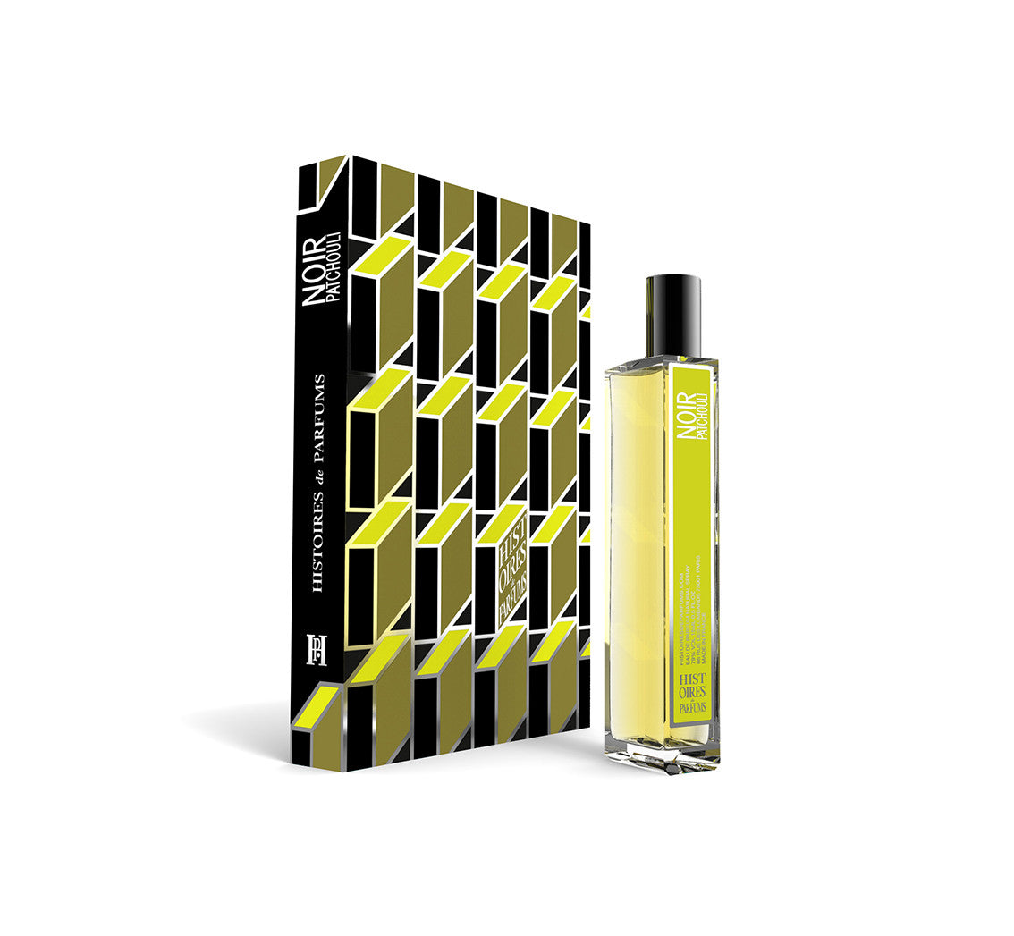 A perfume bottle of Noir Patchouli - 15ml next to its packaging box.