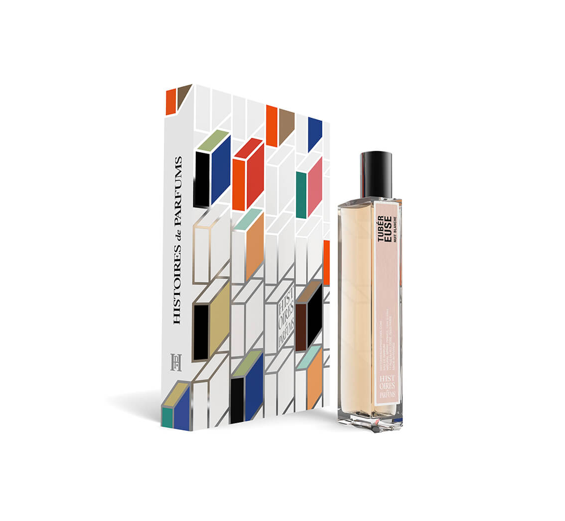 A perfume bottle of TUBÉREUSE NUIT BLANCHE 15ml next to its packaging box. 