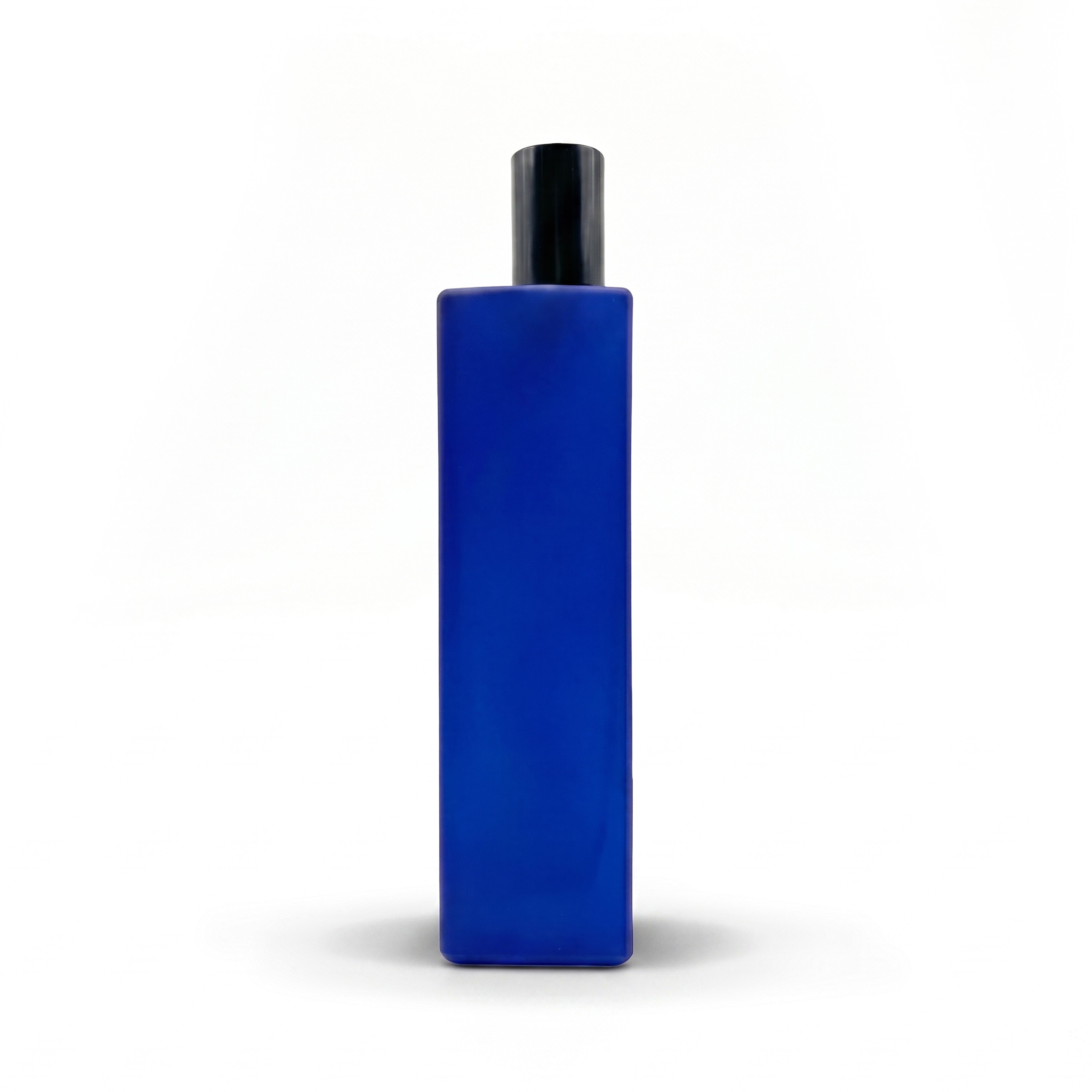 A This is not a bleu bottle 1/.1 cobalt blue bottle with a black cap, on a white background.