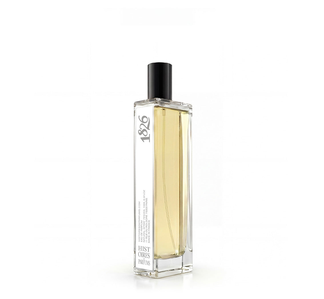 A 1826 glass perfume bottle with a black cap on a white background.