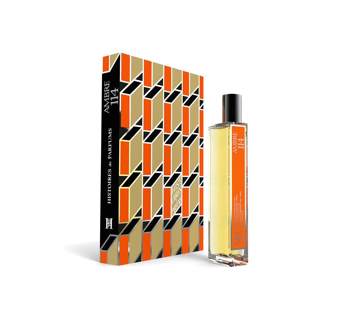 A perfume bottle of Ambre 114 - 15ml next to its packaging box. 