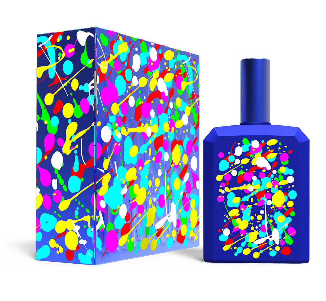A perfume bottle of This is not a blue bottle 1/.2 - 115ml next to its packaging box. 