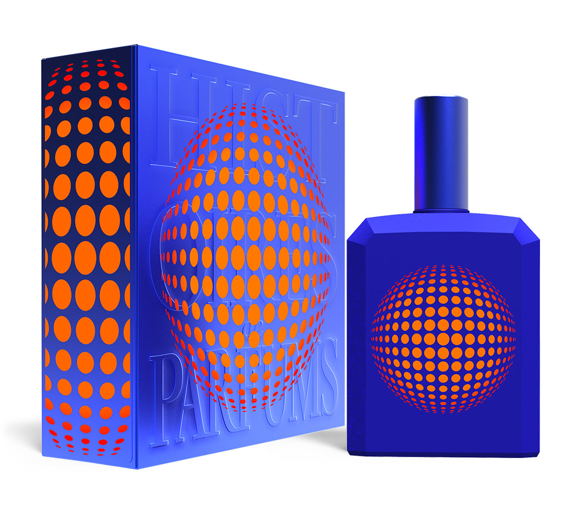 A perfume bottle of This is not a blue bottle 1/.6 -115ml next to its packaging box. 