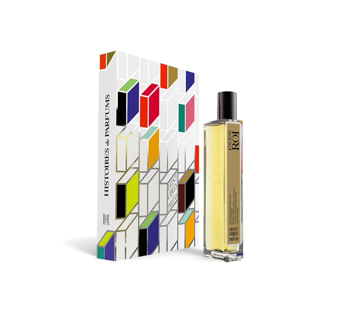A perfume bottle of Encens Roi - 15ml next to its packaging box. 