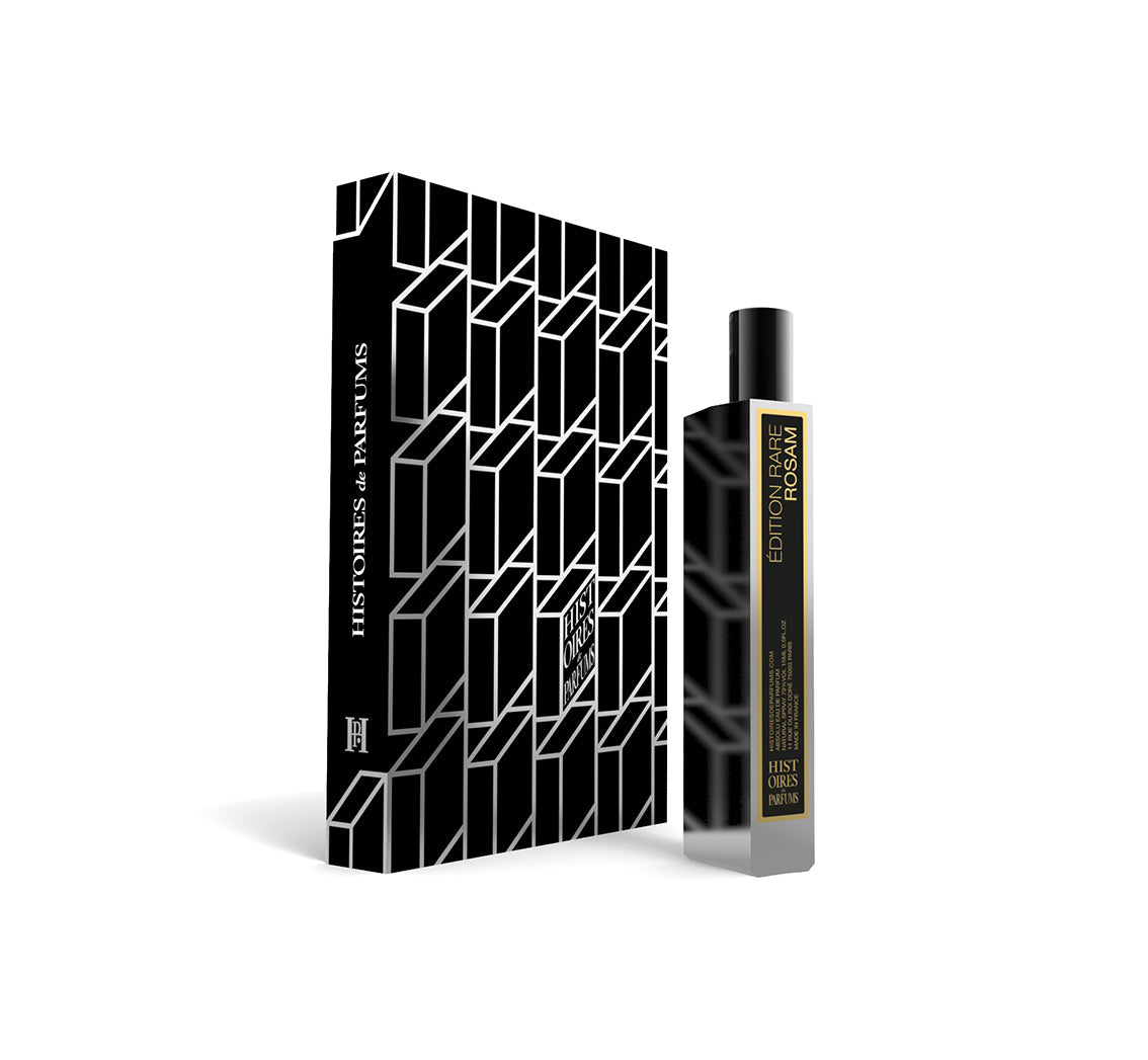 A perfume bottle of Rosam - 15ml next to its packaging box. 