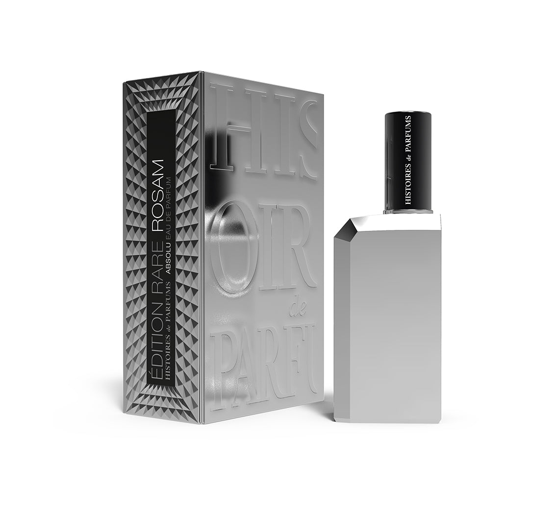 A perfume bottle of Rosam - 60ml next to its packaging box. 