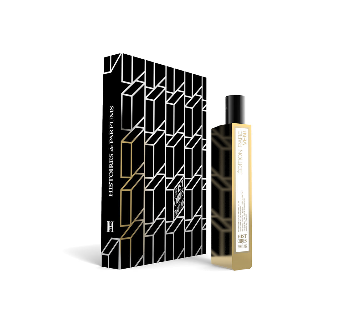 A perfume bottle of Veni - 15ml next to its packaging box. 